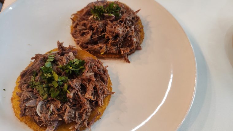 Arepas with shredded beef and herbs